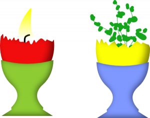 Kerze und Pflanze in Ostereischale